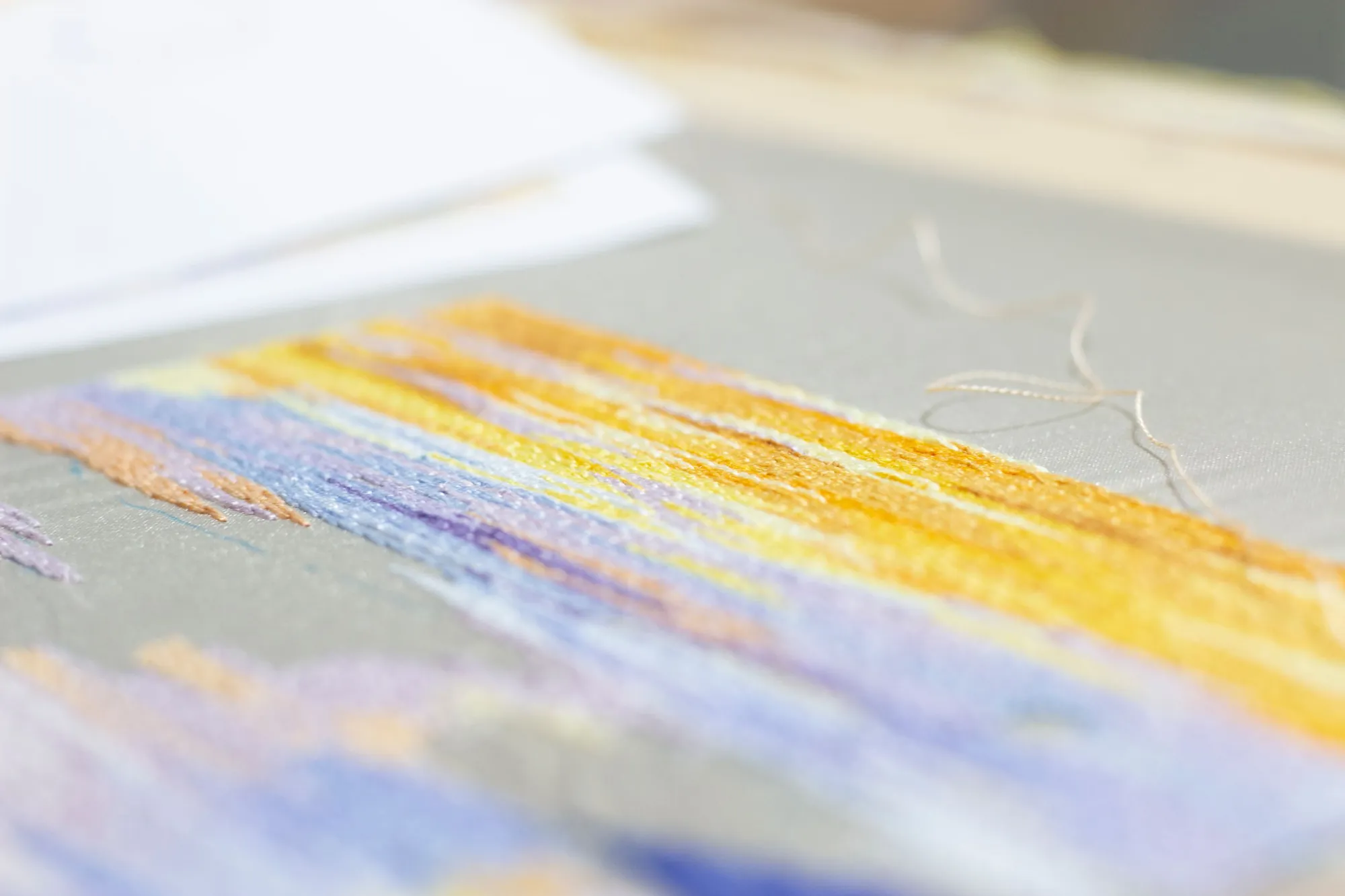Wool stitches covering a canvas