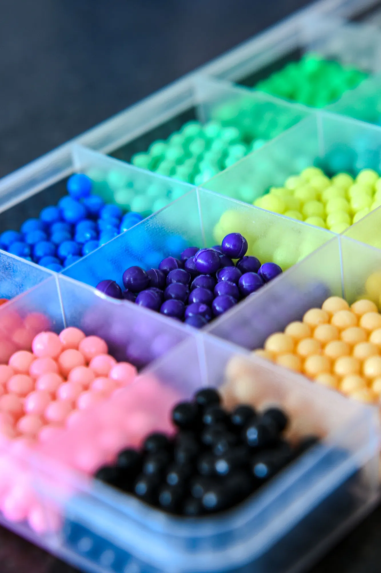 Fuse beads sorted by color, ready for the pegboard